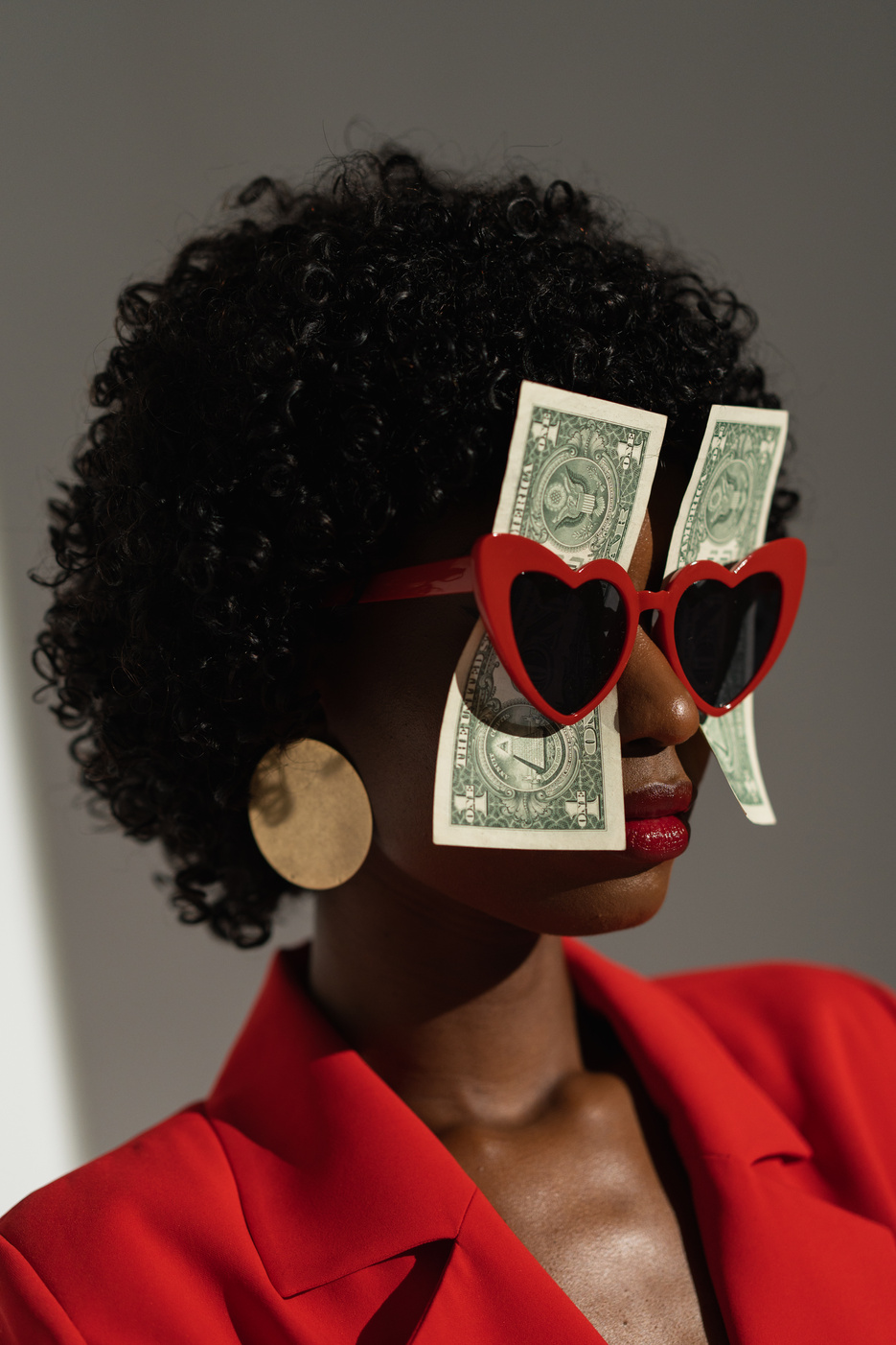 Fashionable Woman with Money on Sunglasses